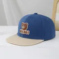 Close-up of kids baseball cap with 3D bear patch and KIMI embroidery detail - 50-54cm (3-10 Years) / Navy Blue And Beige