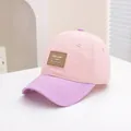 Kinderen baseballpet in roze en paars kleurblok met een luxe bruine lederen patch - Kinderen 2-6 jaar oud ca. 50-52CM / Roze/Lichtpaars