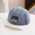 Detailed embroidery of a cartoon girl on a blue denim baseball cap for infants - 48-50cm / Beige