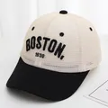 Ademende trucker pet voor kinderen met BOSTON borduursel in zwart en beige - 48-52cm / Zwart