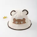 Beige cotton bucket hat for toddlers featuring 3D brown ears and bear face embroidery - Toddler Size / Beige