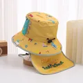 Detail view of yellow baby sun hat with dinosaur fins and protective neck flap covering - 48-50cm / Yellow