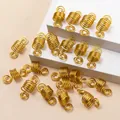 Golden spiral hair coils for dreadlocks and braids displayed on white geometric stands - Silver Spiral