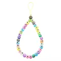Close-up of colorful evil eye beads and a black smiley face charm on a phone lanyard - 1 Colorful Smiley Face Beaded Phone Charm