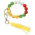 Close-up of Christmas wooden beads with elk tree prints and yellow leather tassel - Yellow