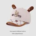 Close-up of baby baseball cap with 3D bunny ears and cute rabbit emblem detail - 48-52cm / Light Coffee