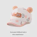 Dettaglio del berretto da neonato con patch orso HELLO e orecchie 3D a forma di biscotto - 48-52cm / Arancione