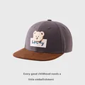 Detail of children's baseball cap featuring a 3D teddy bear patch and Lucky label - Kids 50-54cm / Gray Purple Patchwork Brown