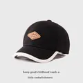 Detail of kids black baseball cap featuring brown leather Kukuji mountain patch - Toddler 1-3 Years 48-50 / Black