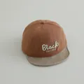 Detailed close-up of brown baby baseball cap with Black embroidery and textured soft brim - 45-48cm (0-3 Years) / Light Coffee