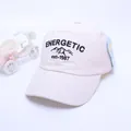 Detail view of off-white kids baseball cap with energetic embroidery and curved brim - 50-54cm / Beige