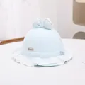 Close-up of light blue baby sun hat with delicate white lace trim and cute bow detail - 1-3 Years / Sky Blue