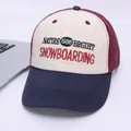 Detail of color-block baseball cap featuring premium embroidery and tricolor panels - Kids 2-7 Years / Navy Blue