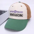 Close-up of vintage patchwork baseball cap with detailed embroidery on a white desk - Kids 2-7 Years / Grass Green