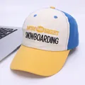 Close-up of nature 1986 bright embroidery on a multi-color cotton baseball cap - Kids 2-7 Years / Yellow