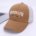 Detail of Brooklyn New York embroidery on brown mesh trucker cap for children - Kids 2-8 Years 50-53cm / Light Coffee
