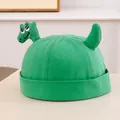 Dettaglio del ricamo a dinosauro su un berretto in cotone verde per bambini - Verde erba