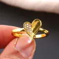 Luxurious gold heart ring with micro-paved cubic zirconia and high polish finish - US 7 / Gold