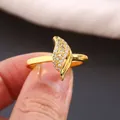Elegant gold leaf ring with micro-pave zircons shown on hand in a luxury setting - US 7 / Gold