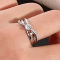 Elegant infinity silver ring with triple layered bands and cubic zirconia center stone - US 7 / Silver