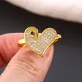 Luxurious gold heart ring with pavé-set zircons and elegant hollow curved design - US 7 / Gold