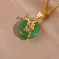 Retro jade-style peace buckle pendant necklace with golden flower and zircon accents - Light Cyan