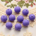 Macro shot of 15mm purple matte silicone beads on lace background for DIY craft projects - 10 Pieces/Pack (15mm) / Purple