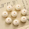 Close-up of eight cream white 15mm silicone round beads for DIY bracelet making - 10 Pieces/Pack (15mm) / Beige