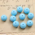 Macro detail of 15mm sky blue matte silicone beads for DIY handmade jewelry crafts - 10 Pieces/Pack (15mm) / Sky Blue