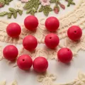 Detail of ten 15mm red matte silicone beads for DIY jewelry making on lace fabric - 10 Pieces/Pack (15mm) / Rose Red