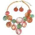 Detailed view of colorful wire-wrapped spiral necklace and earrings with crystals - Rhinestone African Tribal Necklace Earrings