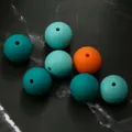 Macro shot of 15mm leopard print and solid silicone beads for DIY jewelry making - 10 Pieces/Pack (15mm) / Blue Green Mixed