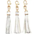 Close-up of white PU leather tassels with gold metal lobster clasps for DIY crafts - Marble White