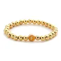 Fashionable golden beaded elastic bracelet with a round orange letter F pendant - Letter F Style