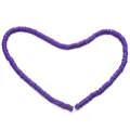 Detailed view of 6mm deep purple flat clay heishi beads arranged in a heart shape - 6mm (Approx. 330-350 Pcs/Strand) / Purple