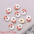 Detailed view of 10-piece Christmas wreath enamel charms measuring 1.6x1.1cm for DIY jewelry - Christmas Wreath (6740BP13-02)