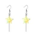 Close-up of yellow star lollipop earrings with iridescent glitter and silver hooks - Yellow Cellophane Star Lollipop Earrings