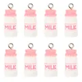 Detail showing eight pink and white resin strawberry milk bottle pendants in a grid layout - Pink
