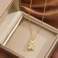 Golden teddy bear necklace with pave-set zircon pendant displayed in a premium jewelry box - Teddy Bear Style (XL2977) / Gold