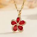 Elegant gold-tone stainless steel necklace with a red pear-shaped crystal flower pendant - Red