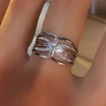 Luxurious silver clover ring with sparkling zircon stones in a multi-layer hollow design - US 6 / Silver