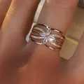 Macro detail of rose gold clover ring with marquise zircons and tiered hollow band - US 6 / Rose Gold