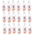Macro shot of colorful fruit slice resin pill charms with silver eyelet hooks in a neat grid - Fruit Pill