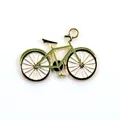 Close-up of green enamel bicycle pendant with golden alloy frame for DIY jewelry - Bicycle / 10 Pieces Pack / Green