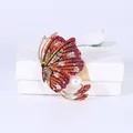 Elegante vintage oranje emaille vlinderbroche met kristallen en een witte parel - Rood