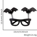 Halloween glittery bat wings glasses with black plush pom-poms on plastic frame - One Size / Black