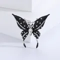Elegant black butterfly brooch with silver edges and white crystal rhinestones for suits - Silver