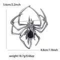 Broche de araña en aleación de plata con cristal negro para trajes y abrigos - Piedra principal negra / Color gunmetal