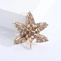 Detailed view of Baroque gold-tone leaf brooch with brown and champagne rhinestones - Gold (3463)