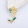 Elegant gold orchid brooch with yellow crystals, green enamel leaves, and white pearl - Gold Yellow